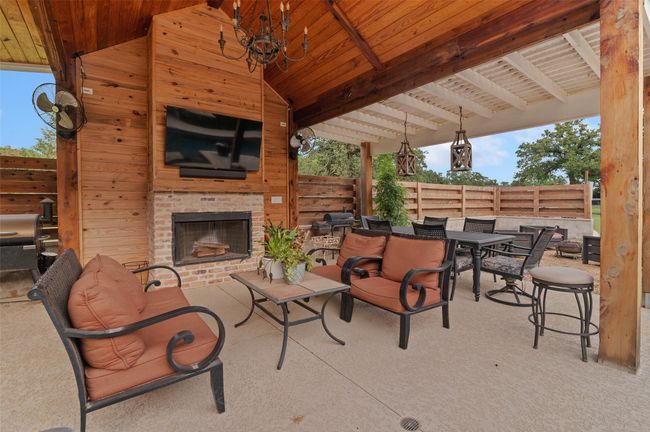Great outdoor space under this covered patio | Image 30