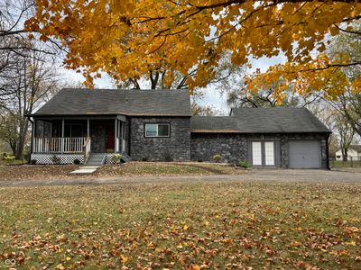 Story Book Rustic Country Home on Almost an Acre | Image 1