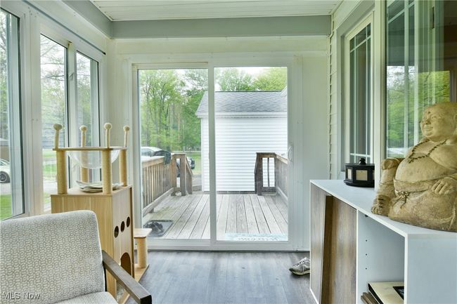 Sunroom featuring healthy amount of natural light | Image 41