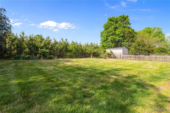 View of backyard and aluminum fencing | Image 31