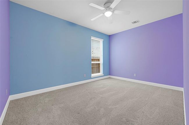 The second bedroom is located on the 1st floor. It has its own full bath. | Image 18