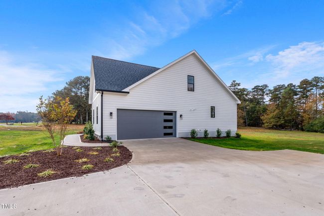 Spacious Driveway and Side entry Garage | Image 57