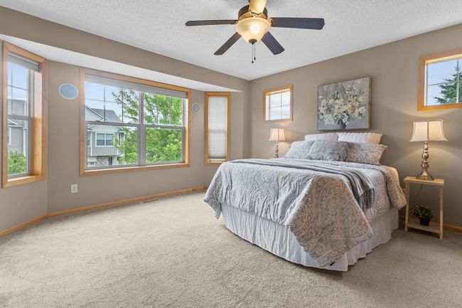 Spacious primary bedroom with charming bay window | Image 13