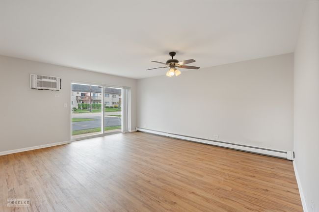Another angle of the Family Room ~ access to slide | Image 5