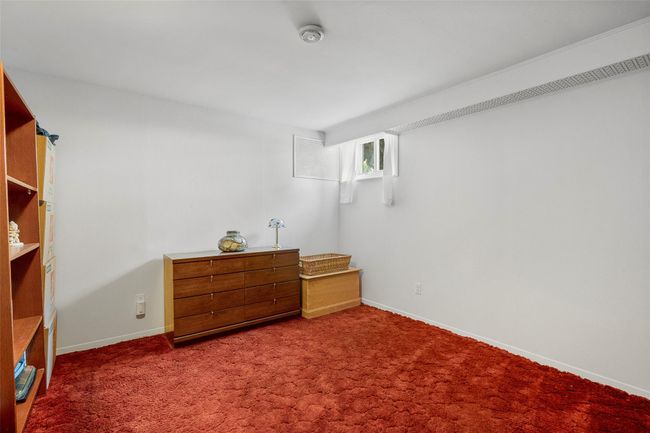Bedroom with carpet floors and baseboards | Image 21