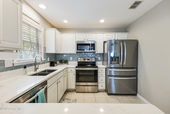 107 Ne 24 Th St, House other with 3 bedrooms, 2 bathrooms and null parking in Oak Island NC | Image 18