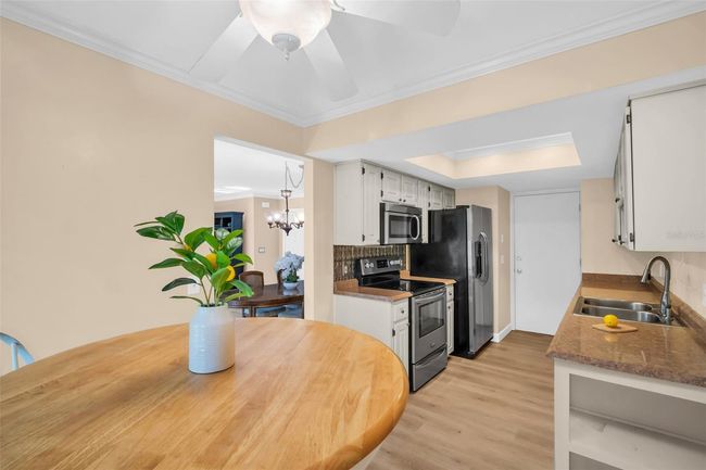 Beautiful kitchen with garage access & breakfast nook for casual dining~ | Image 10