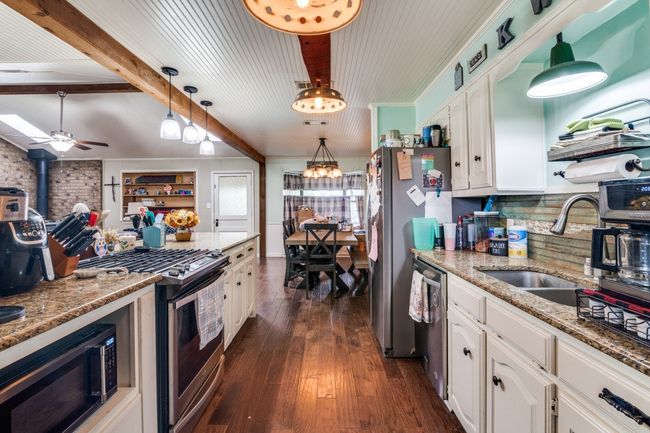 Custom Light Fixture adds so much Interest to this space! | Image 6