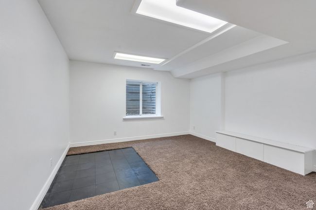 Empty room featuring carpet floors and baseboards | Image 28