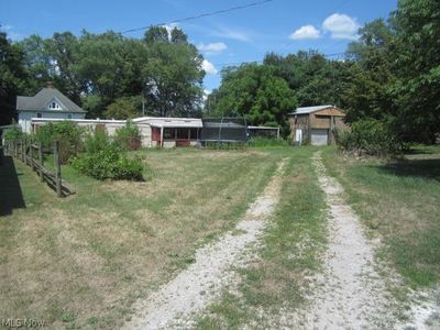 View of yard featuring an outdoor structure | Image 2