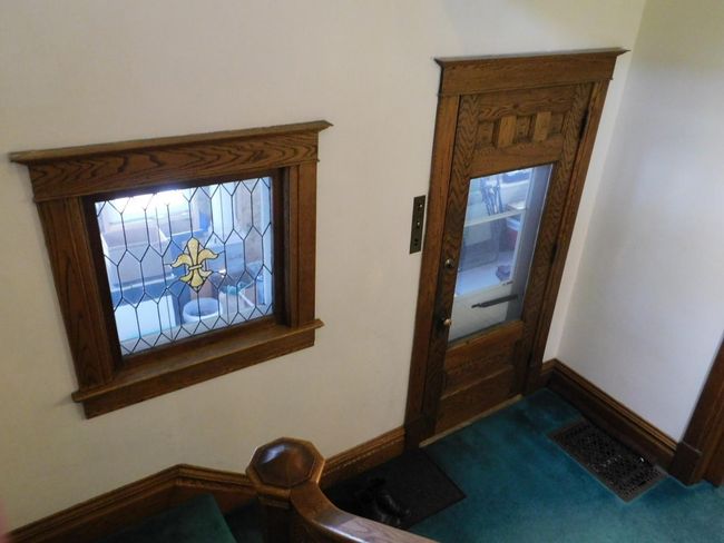 Looking down to foyer from the staircase. | Image 25