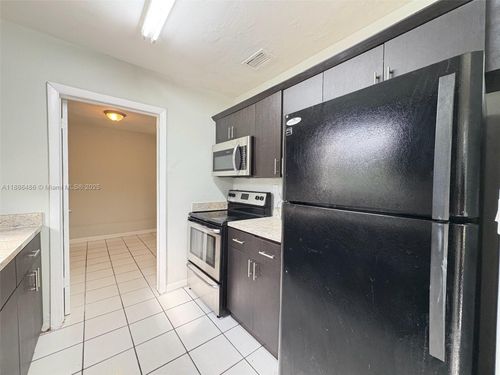 1051 Nw 26th Ave, Fort Lauderdale, FL, 33311-5713 | Card Image