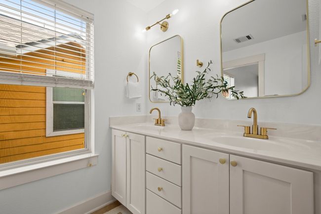 Full bath with double vanity and baseboards | Image 15