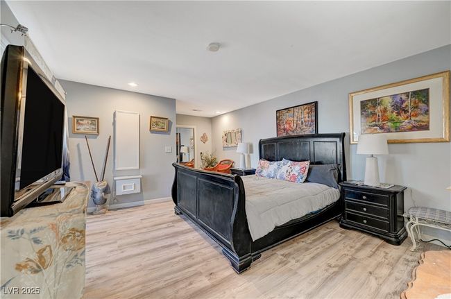 Bedroom featuring light wood-type flooring, recessed lighting, and baseboards | Image 41