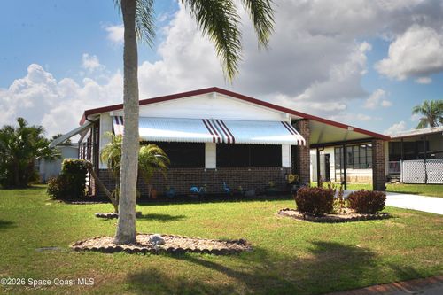 919 Dogwood Dr, Barefoot Bay, FL, 32976-7123 | Card Image