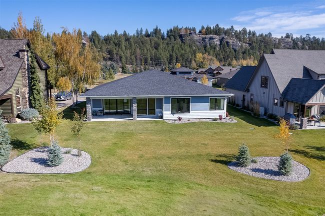 Rear view of house featuring a yard | Image 39