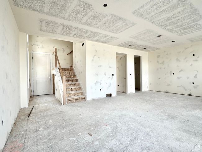 Empty room featuring stairs | Image 6