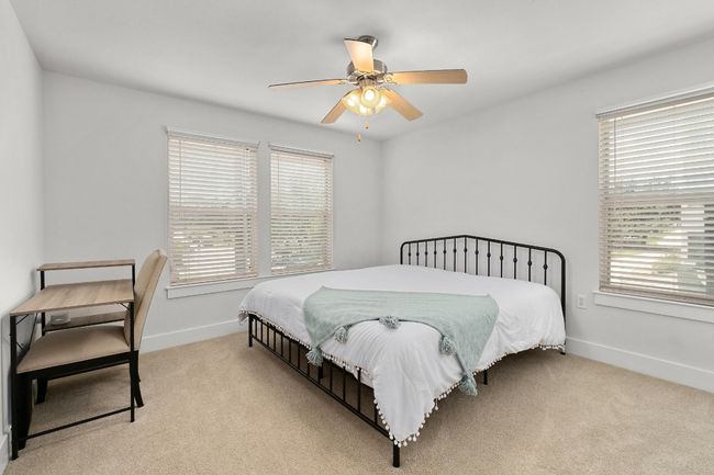 Relaxing master bedroom with great space for a reading nook | Image 15