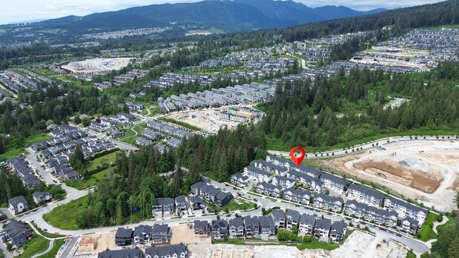 View of property location featuring a heavily wooded area and a mountainous background | Image 30