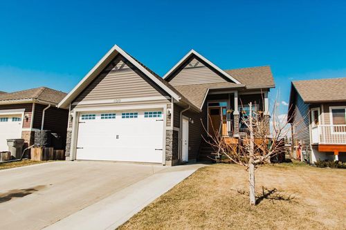 11310 105 A Avenue, Home with 4 bedrooms, 3 bathrooms and 5 parking in Grande Prairie AB | Card Image