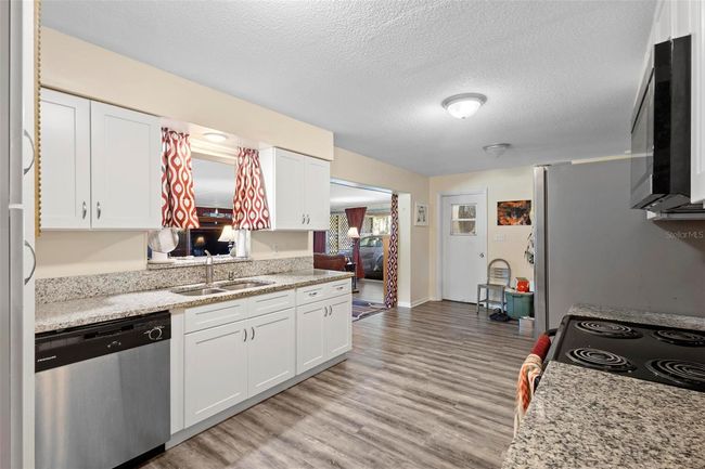 Spacious Kitchen with pass through | Image 8
