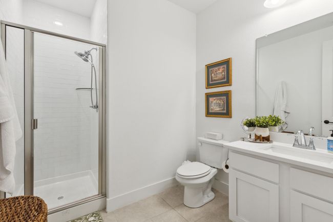 One of 3 full bathrooms - Upgraded shower with floor to ceiling tile, located outside the nursery bedroom | Image 25