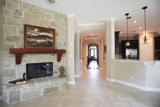 From Living Room the hallway to the front door. | Image 16