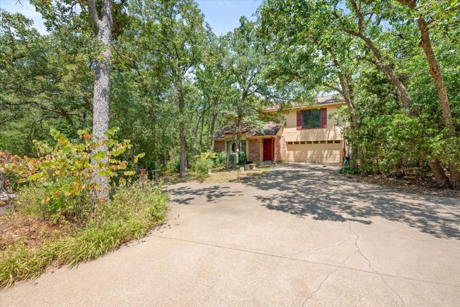 View of front facade with a garage | Image 11