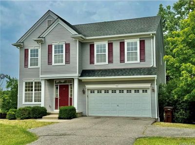 View of front of property with a garage | Image 2