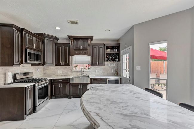 1003 Highland Woods Dr, House other with 4 bedrooms, 3 bathrooms and 2 parking in Highlands TX | Image 13