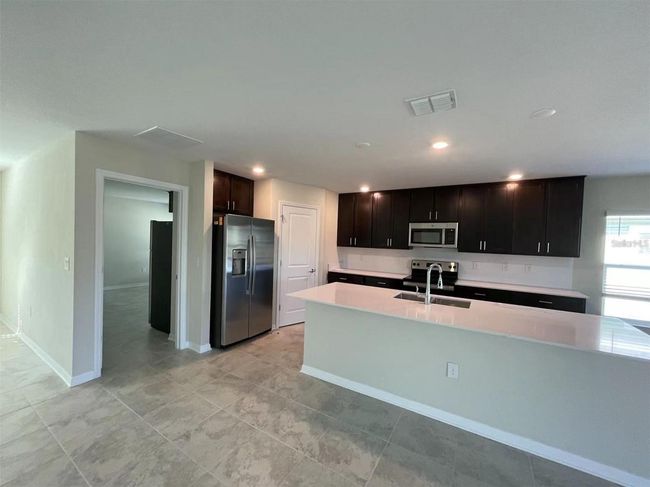 1832 Ancestry Trl, House other with 5 bedrooms, 3 bathrooms and null parking in KISSIMMEE FL | Image 7