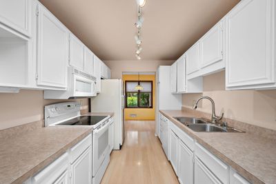 Plenty of counter and cabinet space! | Image 2