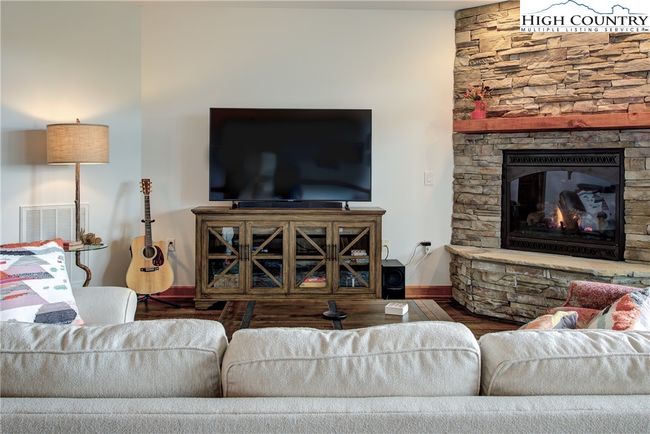 Primary HVAC is a newer 2021 Carrier heat pump, providing worry free electric heat and air conditioning. | Image 13