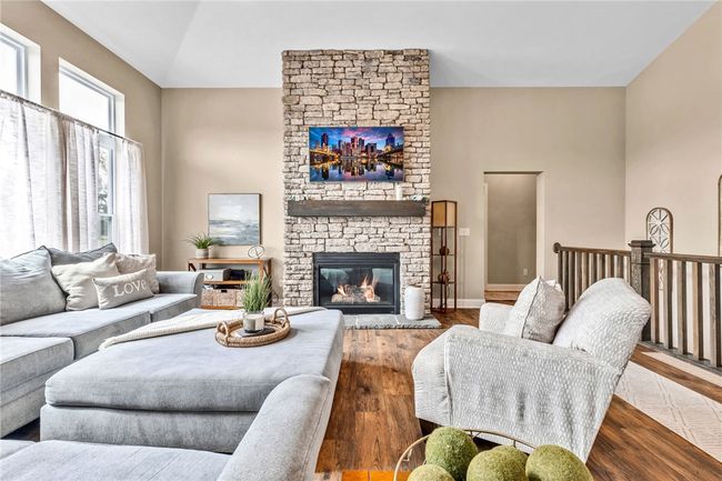 Enjoy the ambiance from the stone fireplace. | Image 17