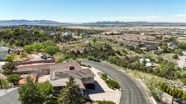 Aerial perspective of suburban area featuring a mountainous background | Image 57