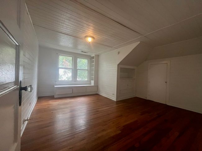 Additional living space with hardwood / wood-style floors, wooden ceiling, and lofted ceiling | Image 27