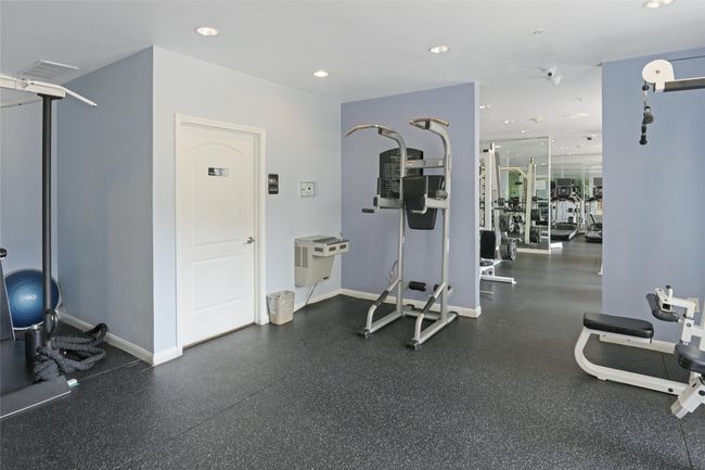 Workout area featuring recessed lighting and baseboards | Image 33