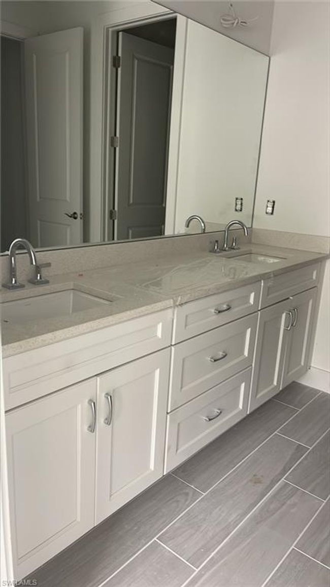 Primary bathroom with quartz countertops and soft-close cabinets and drawers | Image 13