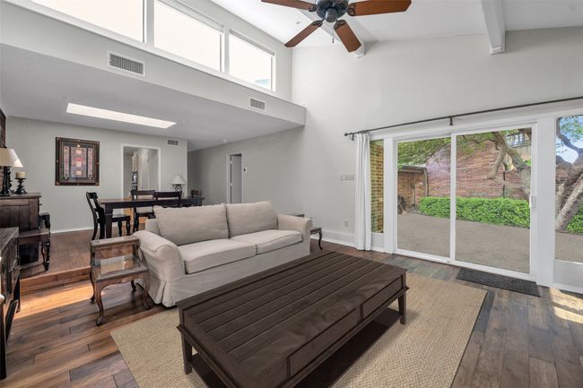 Living room has new sliding doors that offer direct access to the private back patio | Image 7