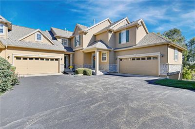 View of front of home featuring a garage | Image 1