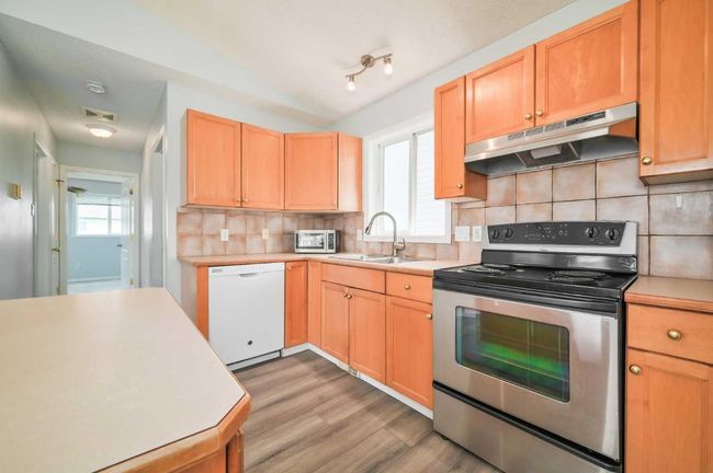 38 Saddlemead Way Ne, House other with 4 bedrooms, 2 bathrooms and 2 parking in Calgary AB | Image 10