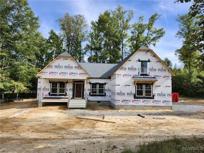 Actual home under construction as of 10/22/2024. The Oakdale floorplan offers 3 bedrooms, 2 full baths, and the convenience of first-floor living on nearly an acre! | Image 1