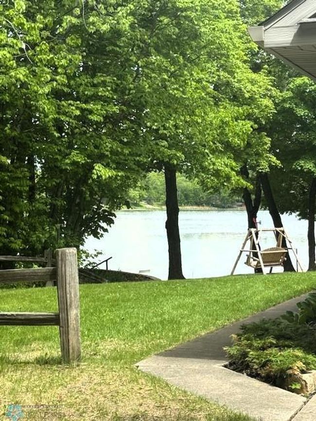 Walkway from 2-stall Attached Garage to Lakefront | Image 14