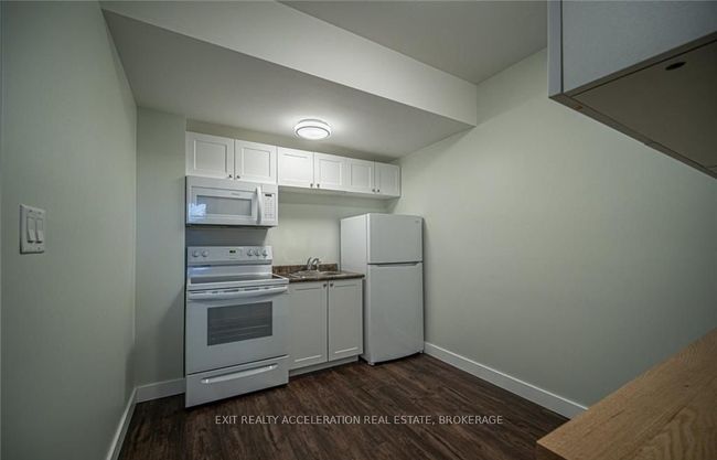 1302 Brackenwood Cres, House attached with 4 bedrooms, 2 bathrooms and 1 parking in Kingston ON | Image 30