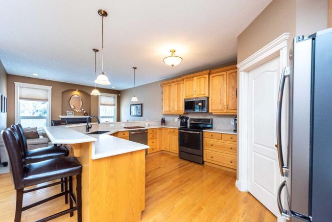 1212 Woodside Way Nw, Home with 4 bedrooms, 2 bathrooms and 4 parking in Airdrie AB | Image 6