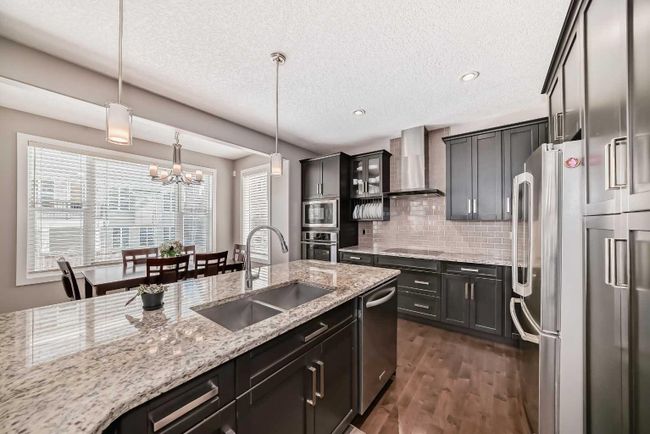 18 Rockford Road Nw, Home with 4 bedrooms, 3 bathrooms and 4 parking in Calgary AB | Image 11