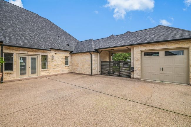 Gated access to all FOUR garage parking spots and drive. | Image 32