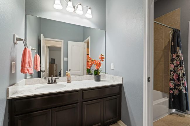This well-appointed bathroom offers a private sanctuary for daily routines or a refreshing escape from the everyday. | Image 17