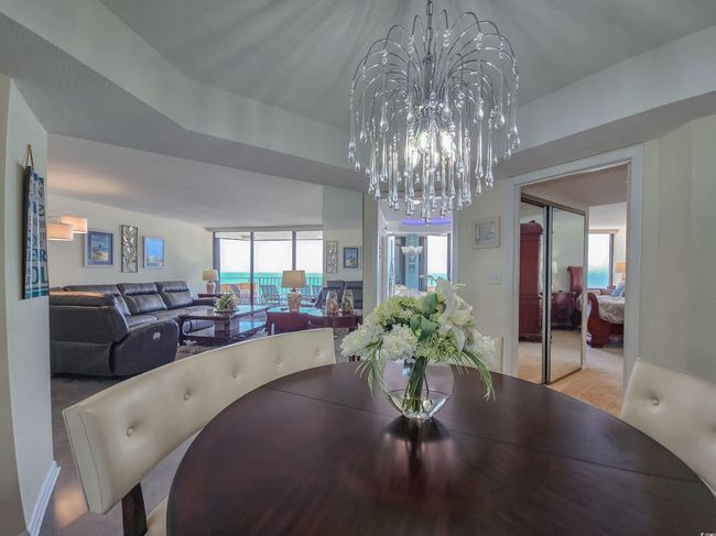 Dining room featuring a chandelier | Image 15