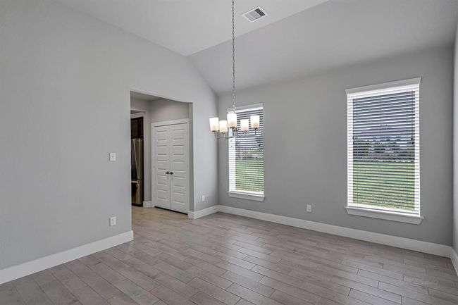 Formal dining room off of kitchen | Image 7